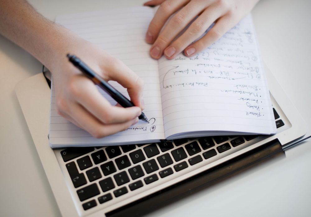 close-up-of-human-hand-writing-in-notebook-161138408-59a08185aad52b0011014fa7